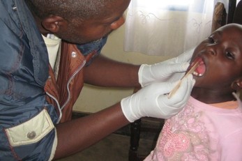 School-based Fluoride Treatment and Oral Health Promotion